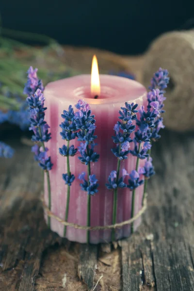 Candle with lavender flowers — Stock Photo, Image