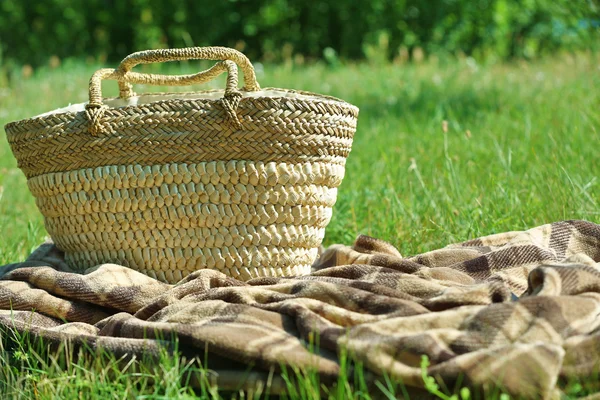 Wicker basket and Plaid for picnic — Stock Photo, Image