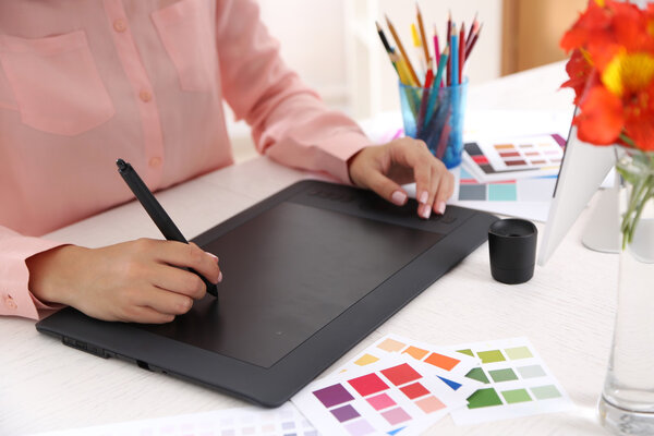 Artist drawing on graphic tablet