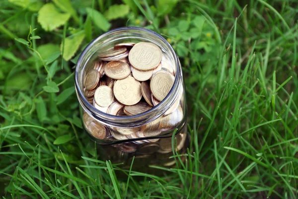 Coins in money jar