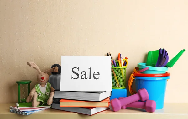 Goods for sale, on light wall — Stock Photo, Image