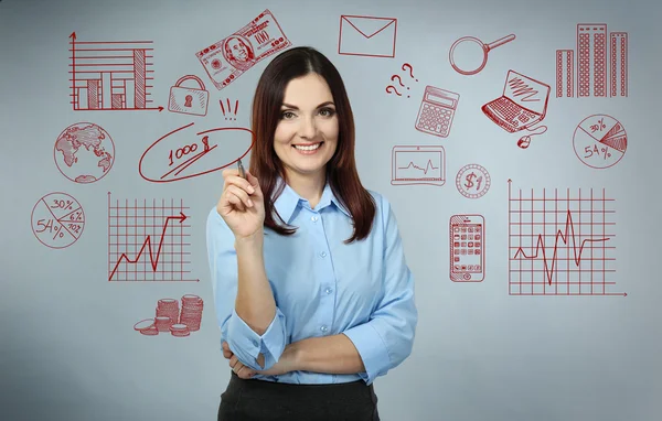 Business woman thinking of her plans — Stock Photo, Image