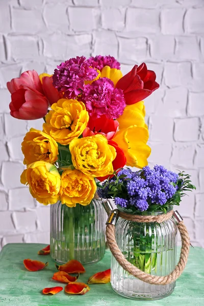 Beautiful flowers in vases — Stock Photo, Image