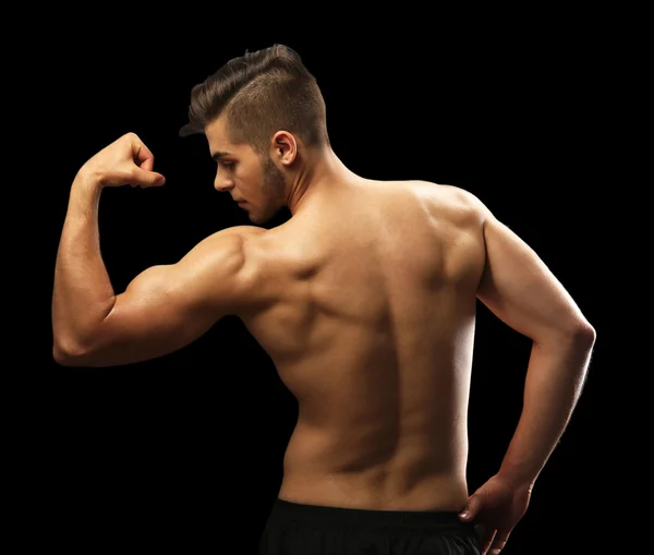 Muscolo giovane uomo — Foto Stock