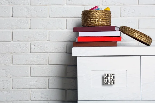 Books with decorative basket — Stock Photo, Image