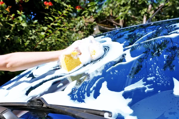 Hand washing car window — Stock Photo, Image