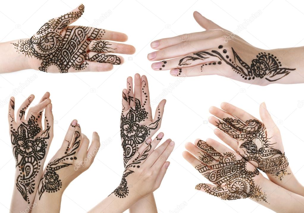 hands painted with henna