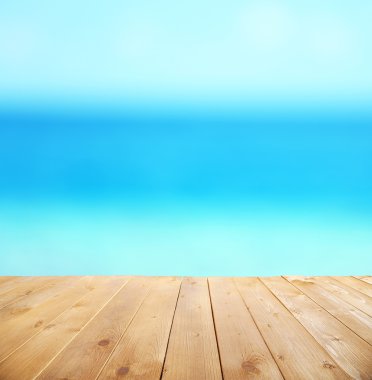 Soyut bulanıklık ile ahşap masa