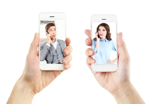 Couple on screens of phones — Stock Photo, Image