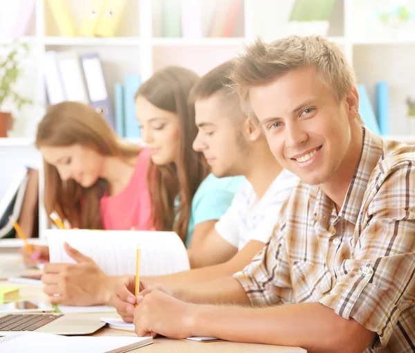 Students sitting in classroom Royalty Free Stock Photos