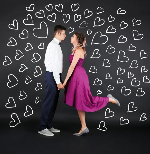 Lovely young couple with hearts — Stock Image Lovely young couple with hearts Royalty Free Stock Photos
