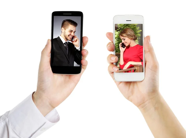 Couple on screens of phones — Stock Photo, Image