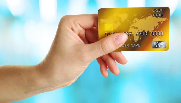 Hand holding credit card — Stock Photo, Image