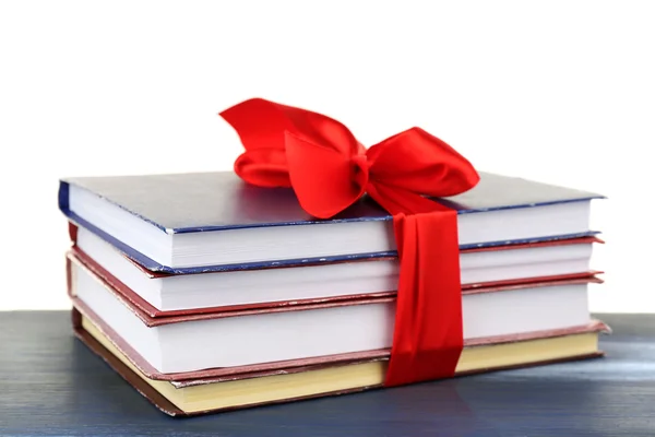 Stack of books with ribbon — Stock Photo, Image