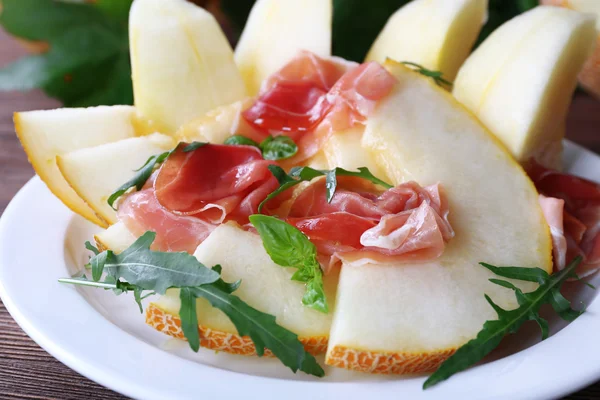 Melon with prosciutto of Parma ham — Stock Photo, Image