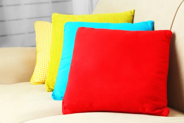 Colorful pillows on sofa — Stock Photo, Image