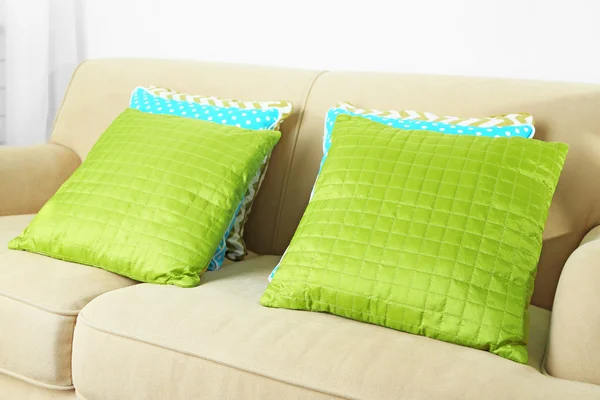 Colorful pillows on sofa — Stock Photo, Image