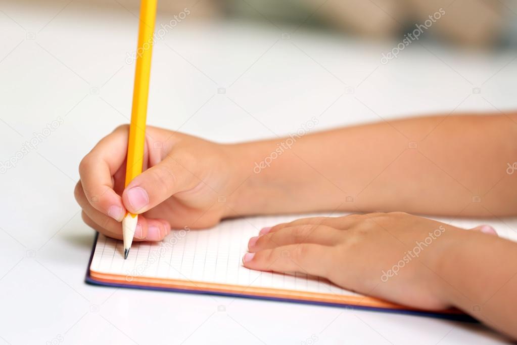 Cute girl at workplace in classroom