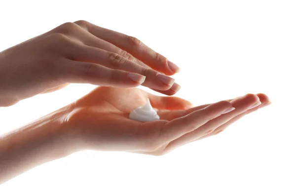 Female hands with cream — Stock Photo, Image