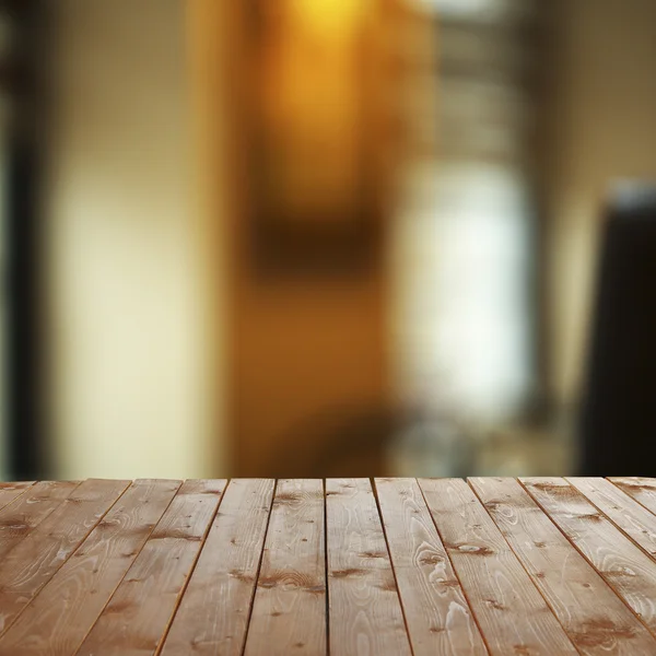 Wooden table  with abstract  background — Stock Photo, Image