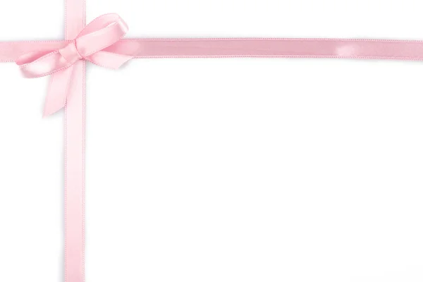 Ροζ κορδέλα τόξο που απομονώνονται σε λευκό — Φωτογραφία Αρχείου