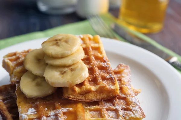 Waffles with sliced banana — Stock Photo, Image