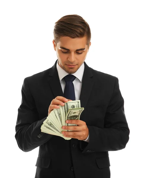 Elegant man in suit holding money isolated on white — Stock Photo, Image