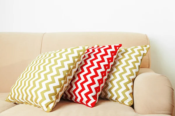 Colorful pillows on sofa — Stock Photo, Image