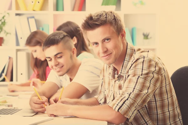 Students sitting in classroom — Stock Photo, Image