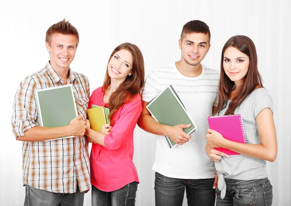 Group of happy young students Stock Image