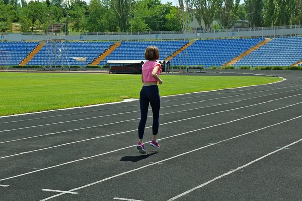 Jovem mulher Jogging — Fotografia de Stock