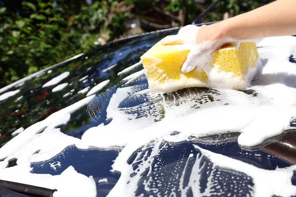 Hand washing car window — Stock Photo, Image