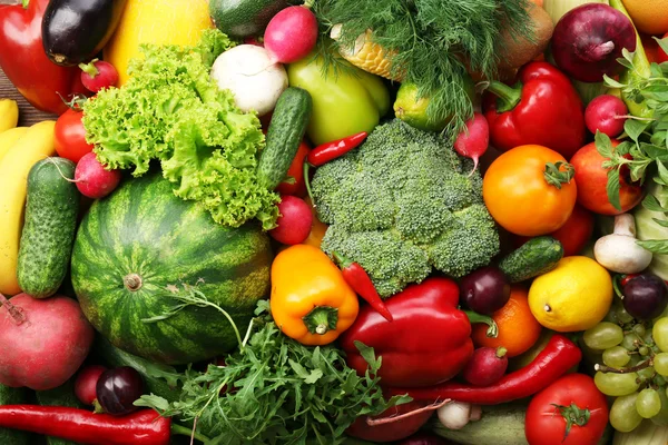 Свіжі овочі та фрукти фон — стокове фото