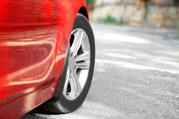 Wheel of red car, outdoors — Stock Photo, Image