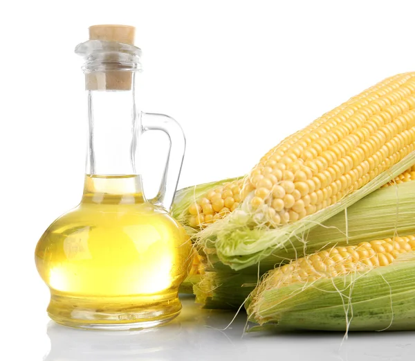 Fresh corn with bottle of oil isolated on white — Stock Photo, Image