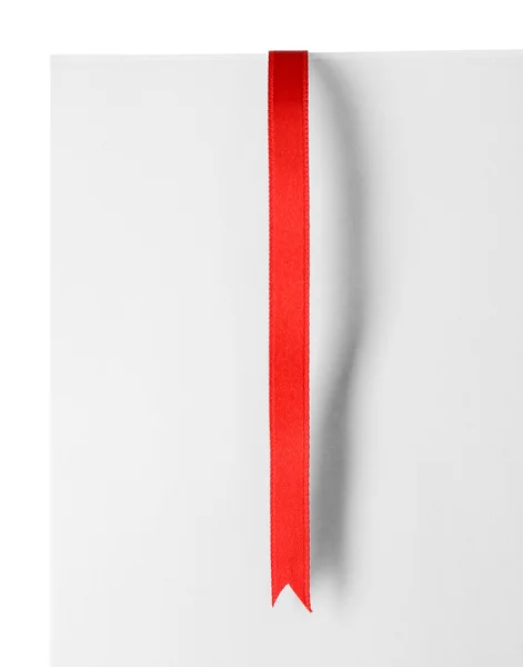 Shiny red ribbon with card — Stock Photo, Image