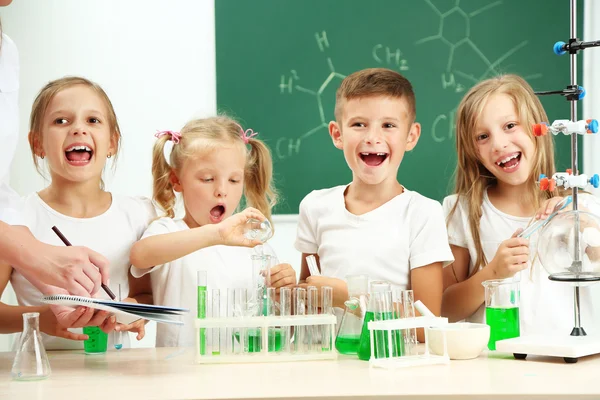 Cute pupils in chemistry class — Stock Photo, Image