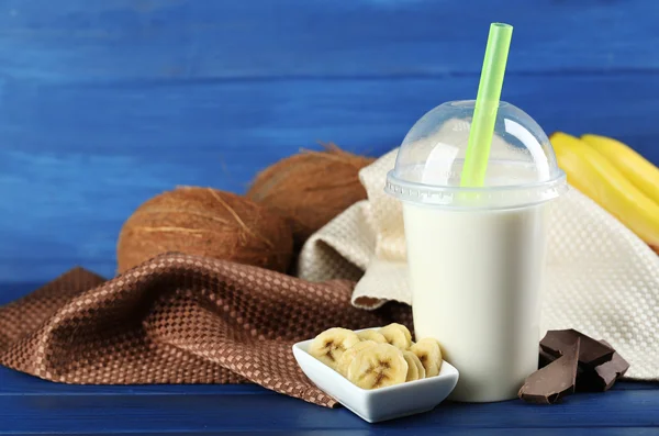 Plastic cup of milkshake — Stock Photo, Image