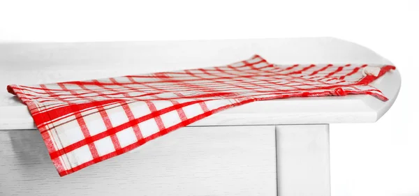 Mesa de madeira com guardanapo isolado em branco — Fotografia de Stock