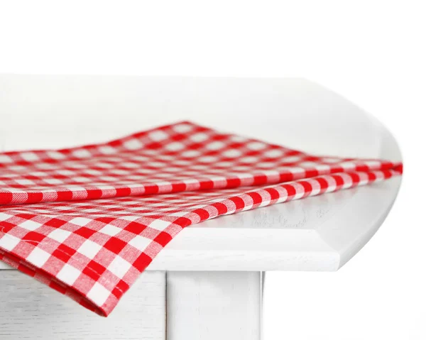 Wooden table with napkin isolated on white — Stock Photo, Image