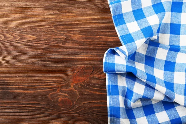 Napkin on wooden background — Stock Photo, Image