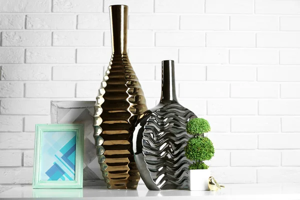 Modern vases on floor in room — Stock Photo, Image