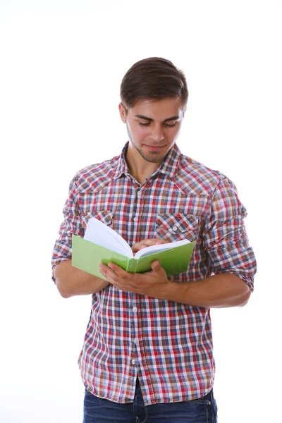 Junger Mann mit Buch auf weißem Hintergrund — Stockfoto