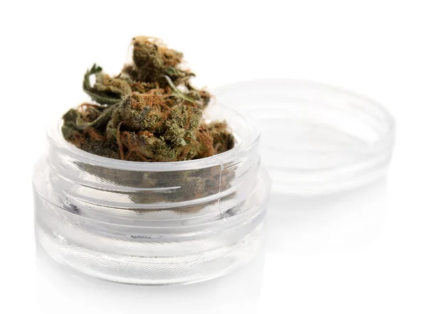 Cannabis medicinal seco en frasco aislado en blanco — Foto de Stock