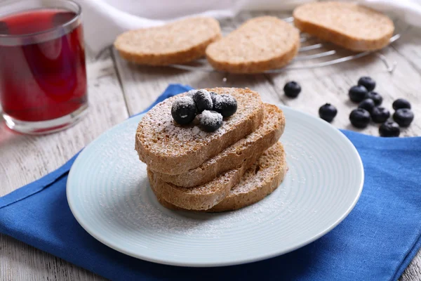 Fresh toast with berries and glass of juice on table close up — Stock Photo, Image