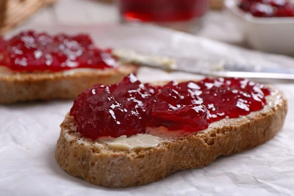 Fresh toast with butter and jam on table close up — Stock Photo, Image