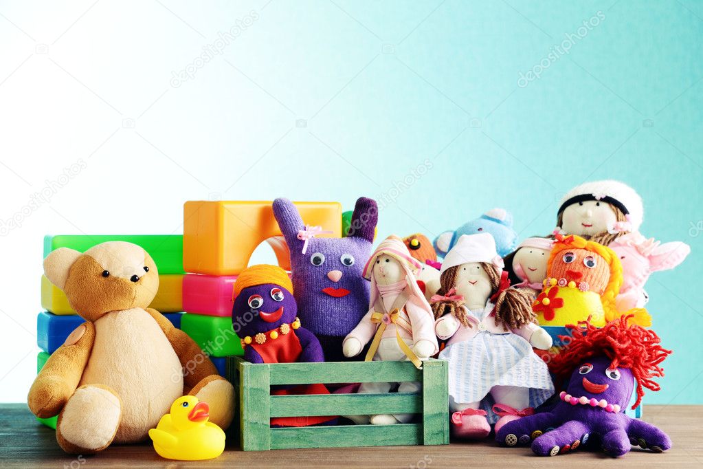 Pile of toys on blue background