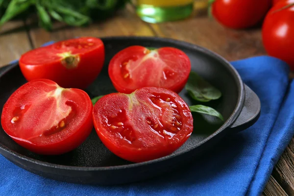 Red tomatoes on napkin — Stock Photo, Image