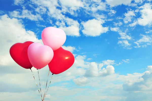 Love heart balloons on sky background — Stock Photo, Image