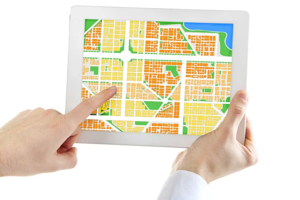 Male hand holding tablet pc with map — ストック写真